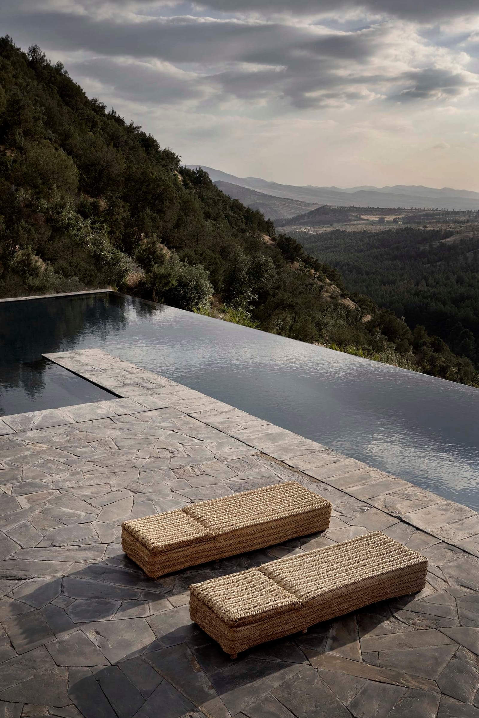 Pool edge and sun loungers above the valley, Villa E